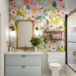 Small bathroom with wallpaper.