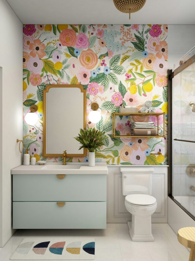 Small bathroom with wallpaper.